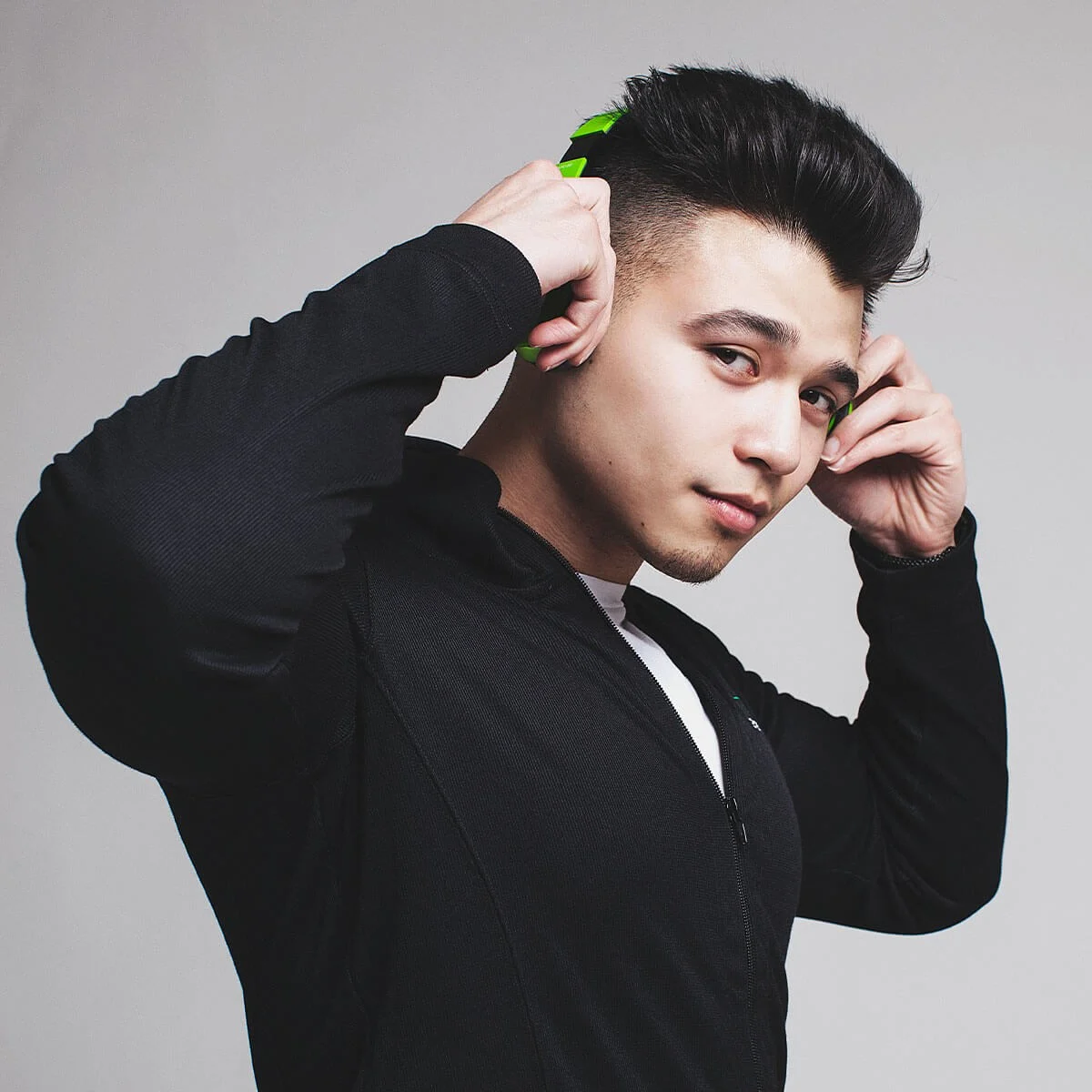 MINT campaign portrait with green styling detail